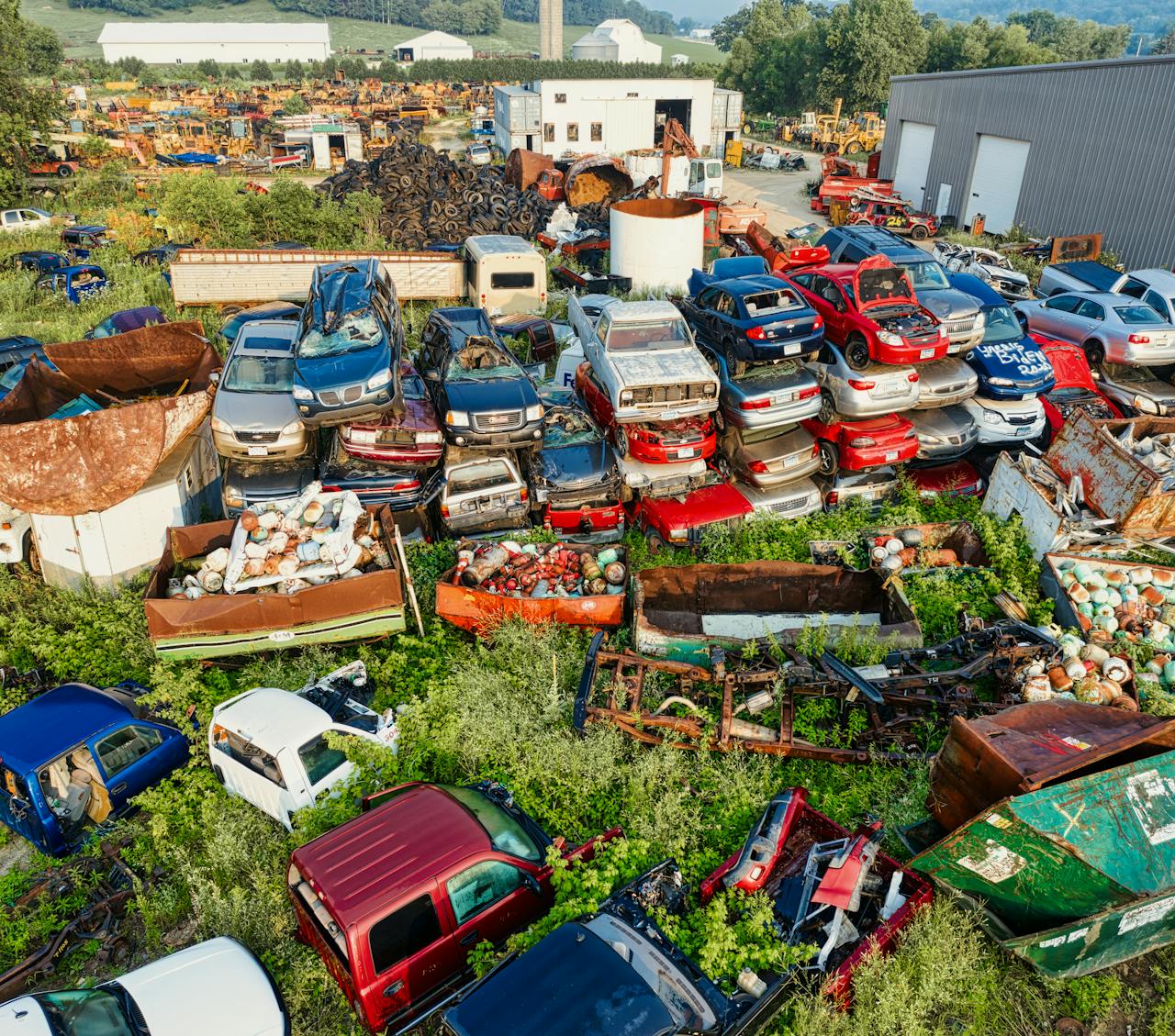 Aerial photograph of a recycling yard filled with old cars and parts, Saint Charles, Minnesota.